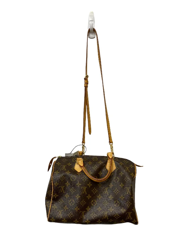 Handbag Designer By Louis Vuitton  Size: Small