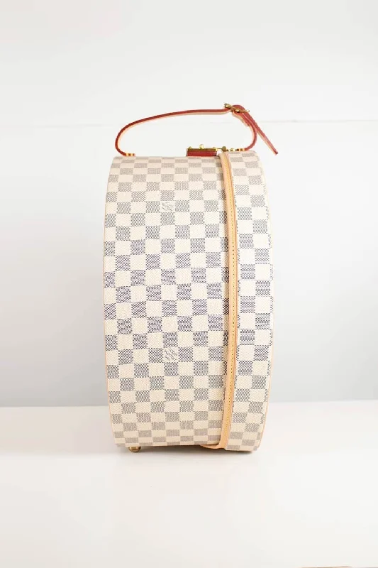 LOUIS VUITTON Damier Azur canvas Boite Chapeaux Hat Box 40 with natural cowhide leather, adjustable top handle and polished brass hardware.