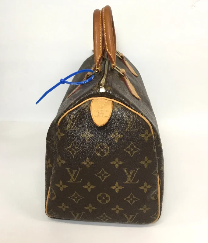 Handbag Luxury Designer By Louis Vuitton  Size: medium